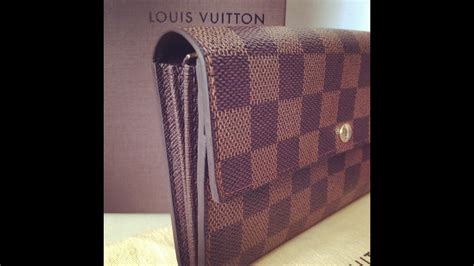 louis vuitton sarah wallet button replacement